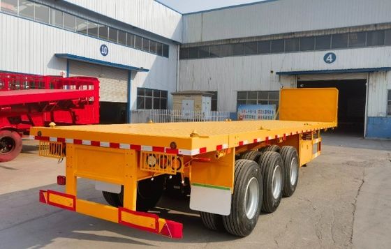 Wosheng ha un carico massimo di 30000 kg 3 assi 4 assi contenitore in acciaio semirimorchio a letto piatto