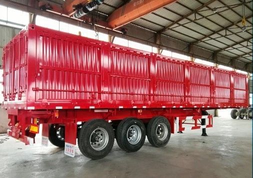 Richiesta del cliente Semi-remorco a scarico laterale idraulico con tre assi e materiale in acciaio