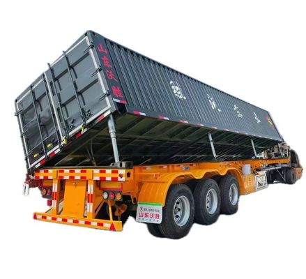 Trailers a tre assi a ribaltamento laterale con funzione di sollevamento idraulico e scarico laterale