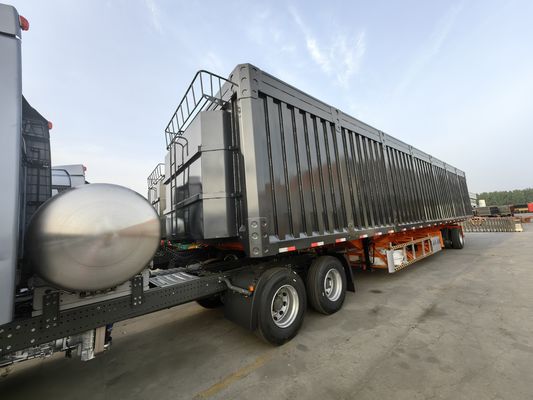 Trailers a tre assi a ribaltamento laterale con funzione di sollevamento idraulico e scarico laterale