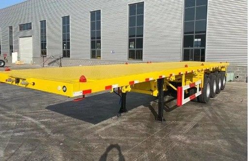 Peso di 7,0 tonnellate 3 assi 4 assi Capacità 50-80 tonnellate semirimorchio a letto piatto per camion
