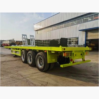 rimorchi del camion del contenitore del letto piano di 20ft 40ft 3 rimorchio dei semi a base piatta resistente di 4 assi