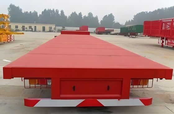 Q345b Fascio principale 3 assi 20ft 40ft Container Trasporto 60-100Tons Flat bed Flatbed Truck Semi-trailer