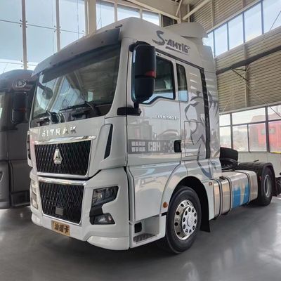 Camion a traino a sinistra a guida manuale Camion a traino diesel Camion a traino per trasporti pesanti Camion a rimorchio